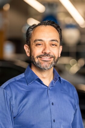 Staff member Bruce Chatterjee from 64acfcea6765