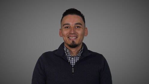 Staff member Jesse Cerda from 64acfcea6765