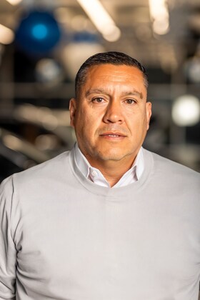 Staff member Juan Martinez from 64acfcea6765