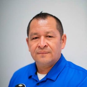 Staff member Sergio Salgado from 64acfcea6765