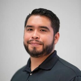 Staff member Aldo Garcia from 64acfcea6765