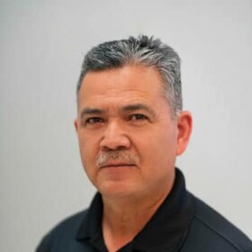 Staff member Tony Carreon from 9f2990df265d