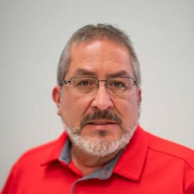 Staff member Pachis De La Garza from 0c513fc0283b