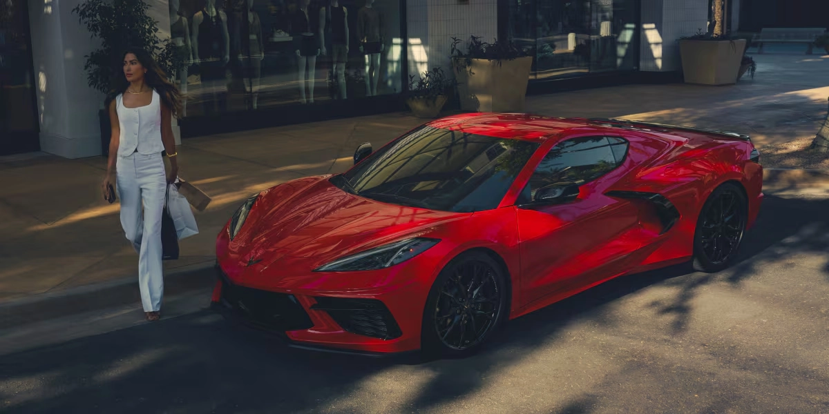 2026 Chevrolet Corvette Stingray exterior showing mid-engine proportions and forged wheels