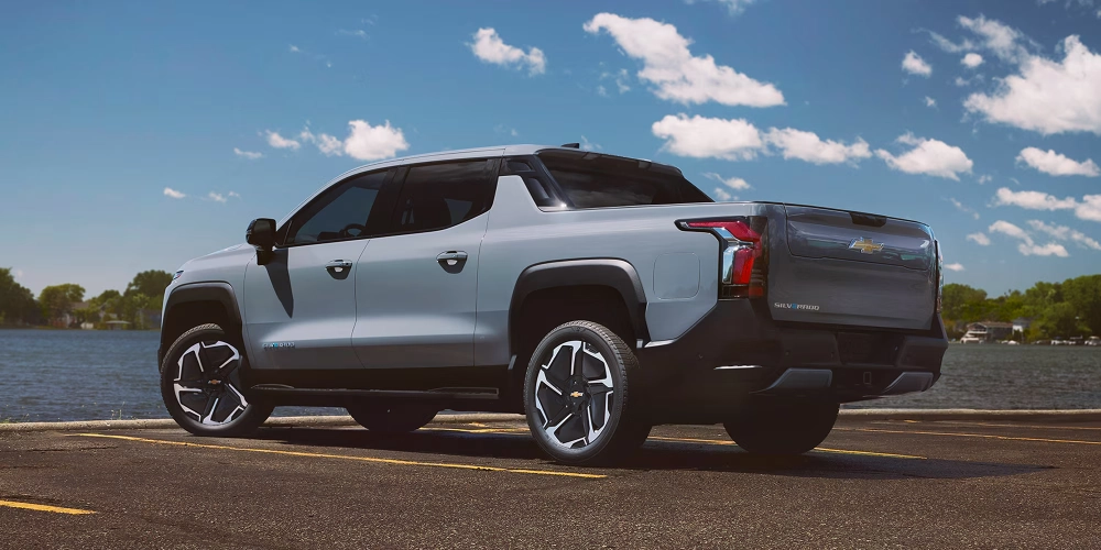 2026 Chevrolet Silverado EV exterior with LED lighting signature and large wheels