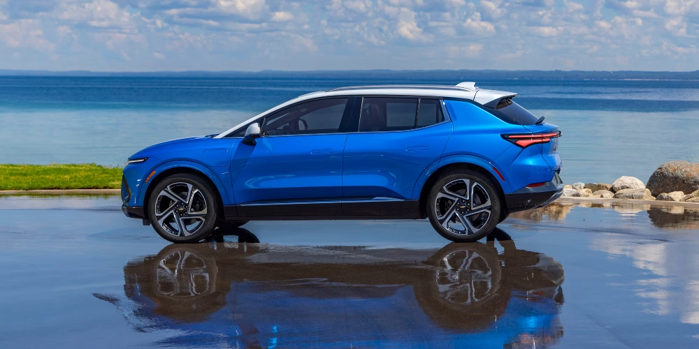 2026 Chevrolet Blazer EV exterior with illuminated front light bar and two-tone roof