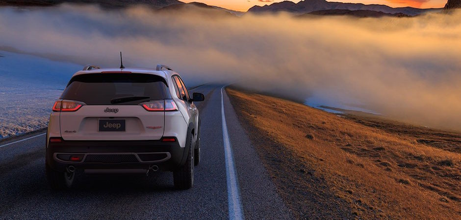 Test Drive a 2019 Jeep Cherokee at Greenway CDJR A 2019 Jeep Cherokee driving through fog