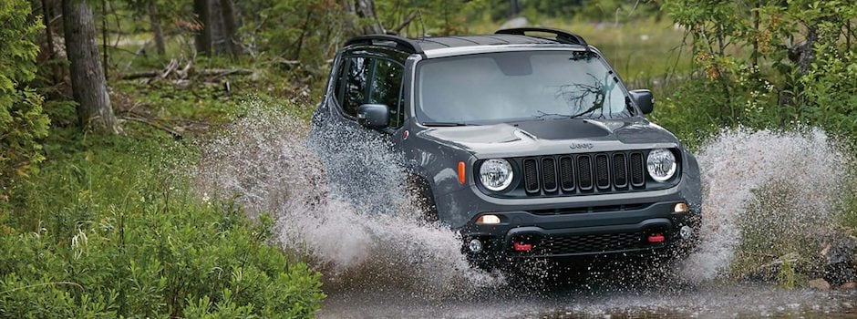 A 2018 Jeep driving through water