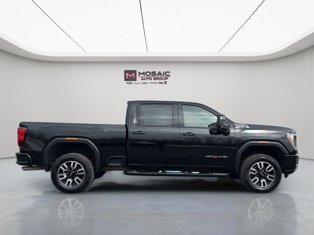 Used 2023 GMC Sierra 3500HD AT4 with VIN 1GT49VE75PF125982 for sale in Zumbrota, Minnesota