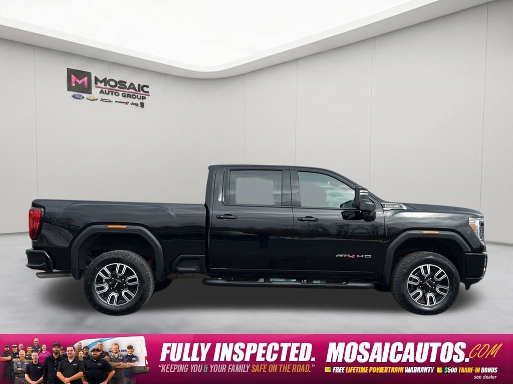 Used 2023 GMC Sierra 3500HD AT4 with VIN 1GT49VE75PF125982 for sale in Zumbrota, Minnesota