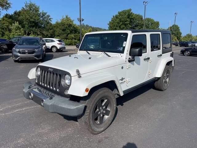 Used 2015 Jeep Wrangler Unlimited Sport with VIN 1C4BJWDG1FL573013 for sale in Saint Albans, WV