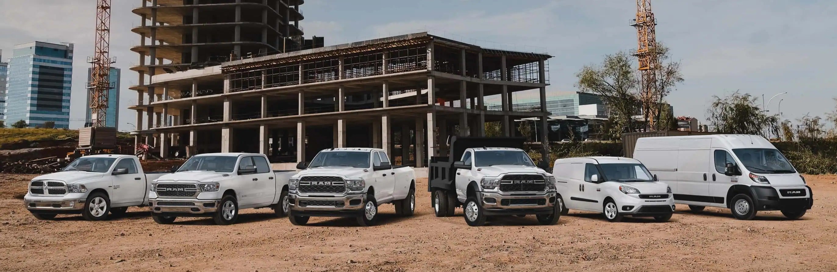 5 Ram vehicles in front of a construction zone