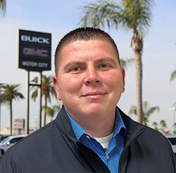 Staff member Luis Chaides from 8d8ba7b3eddb