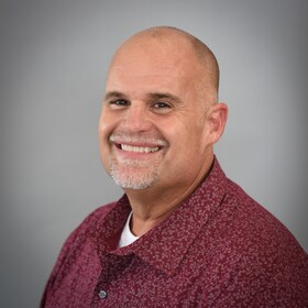 Staff member CHRIS ARNOLD from 69b67ae2f766