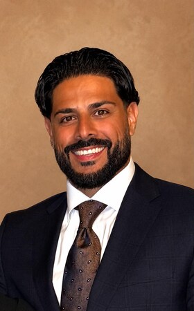 Staff member Hamoody Rafih from ID_3a31e5b7e5d4