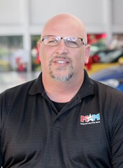 Staff member CHARLIE TAYLOR from ID_7ce003