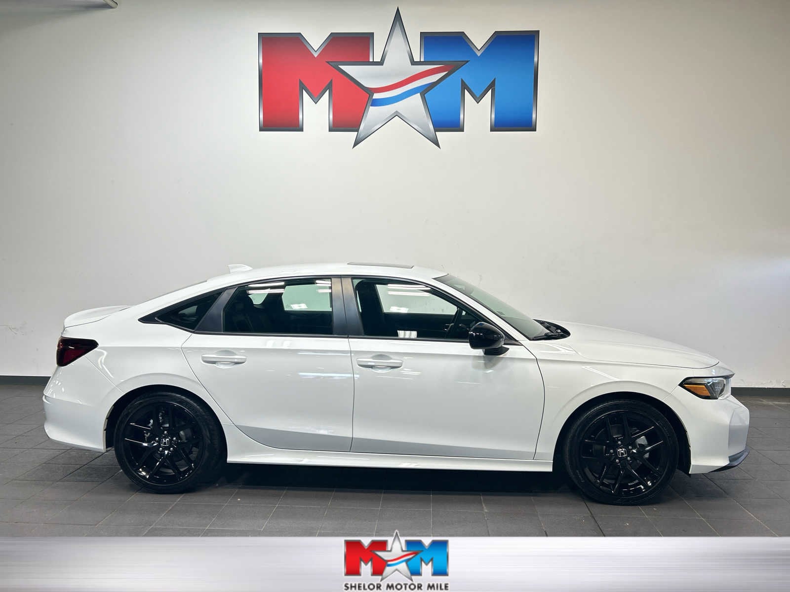 2025 Honda Civic Sport Hybrid CVT's photo