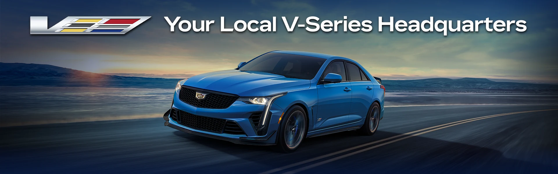 Blue Cadillac CT4-V driving on a coastal road at sunset - Motor Werks Cadillac is Your Local V-Series Headquarters