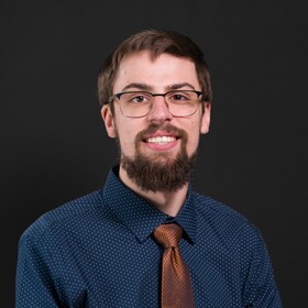 Staff member TYLER GRASSEL from ID_833592de1d20