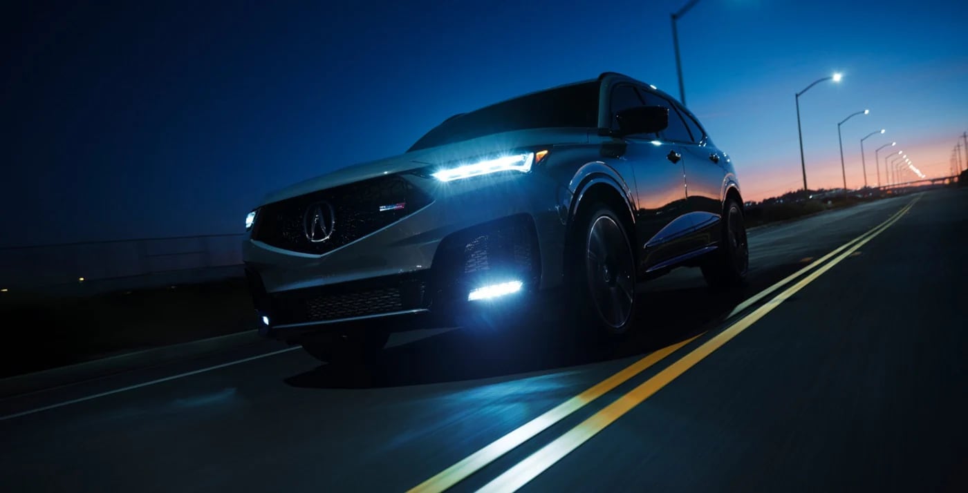 2026 Acura MDX Type S driving on bridge at night