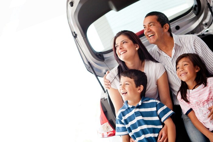 Family_Sitting_In_Trunk_Of_Car.jpg