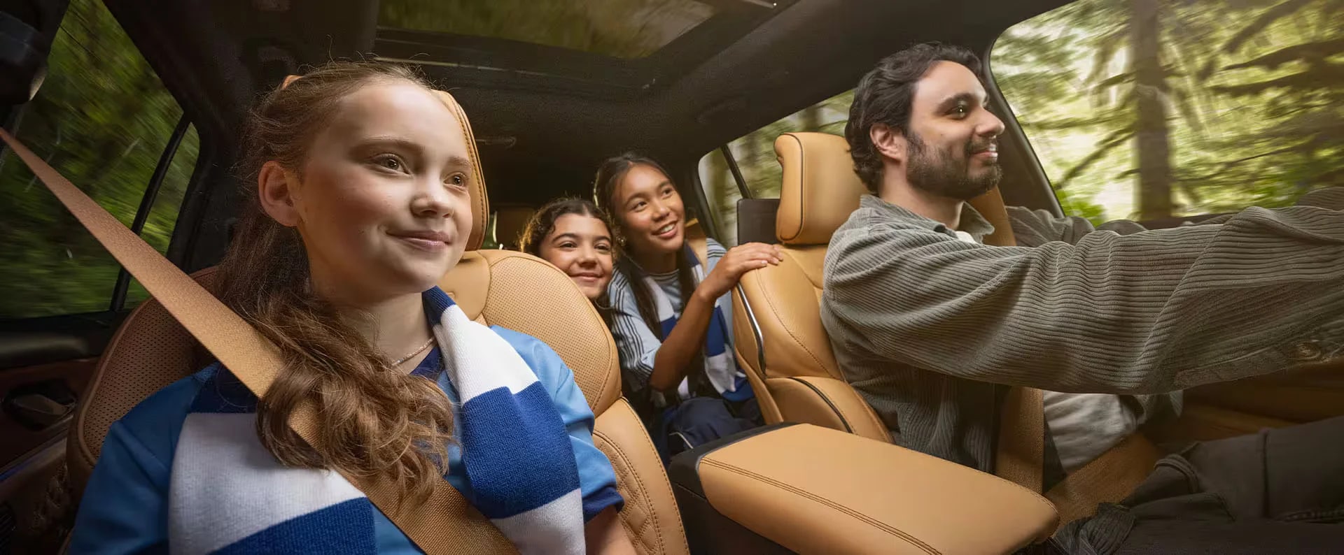 2025-jeep-grand-cherokee-interior-family.png