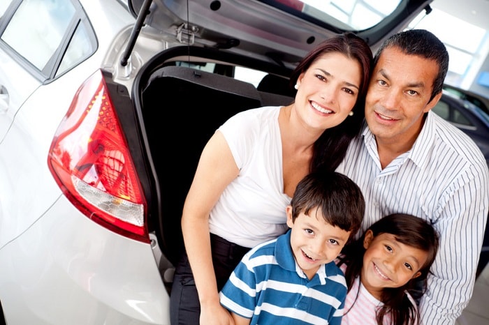 Family_In_Front_of_Car.jpg