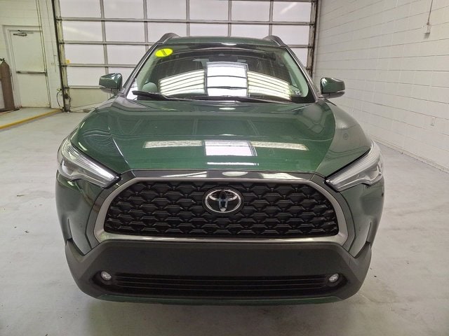 Certified 2022 Toyota Corolla Cross XLE with VIN 7MUDAABGXNV010382 for sale in Northfield, Minnesota