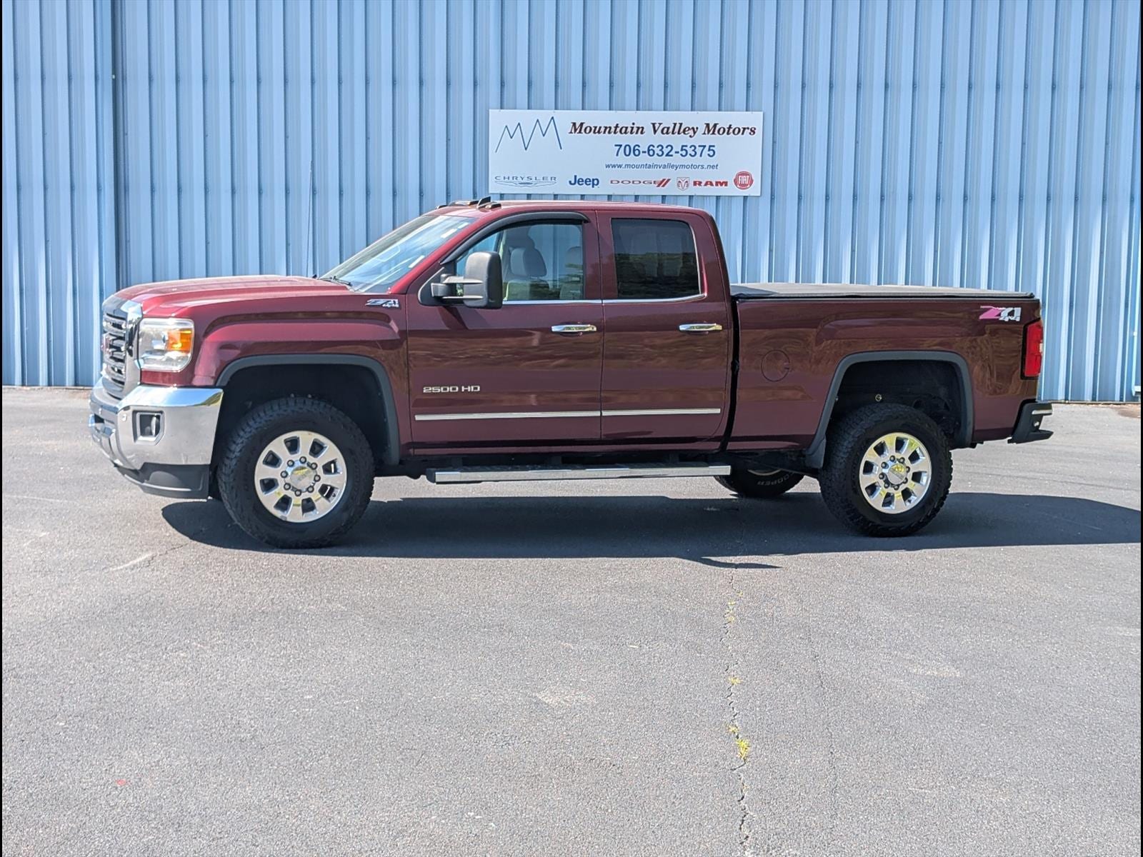 2015 GMC Sierra 4WD Double Cab Short Box SLT's photo