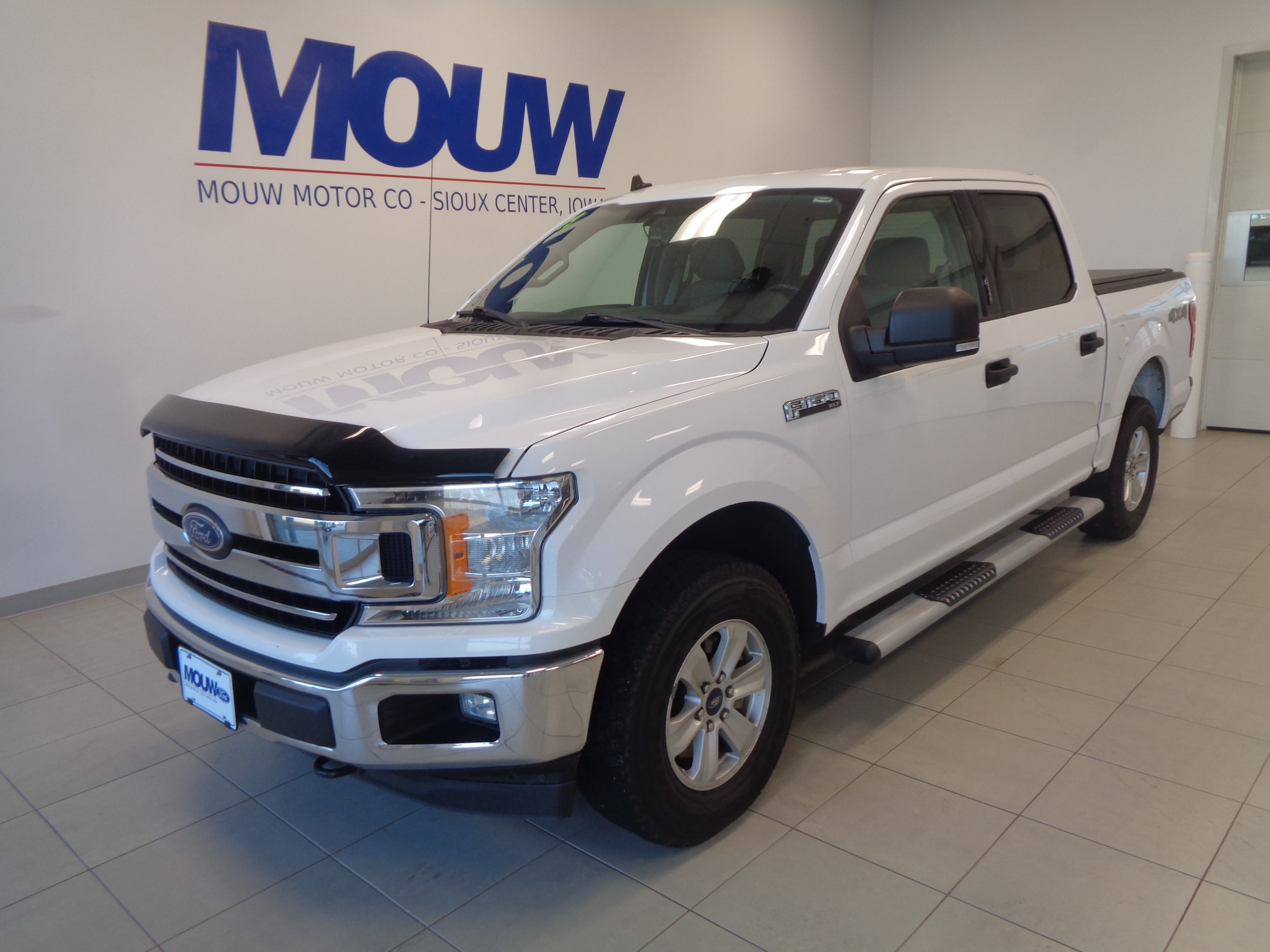 Used 2019 Ford F-150 XLT with VIN 1FTEW1E47KKD16590 for sale in Sioux Center, IA