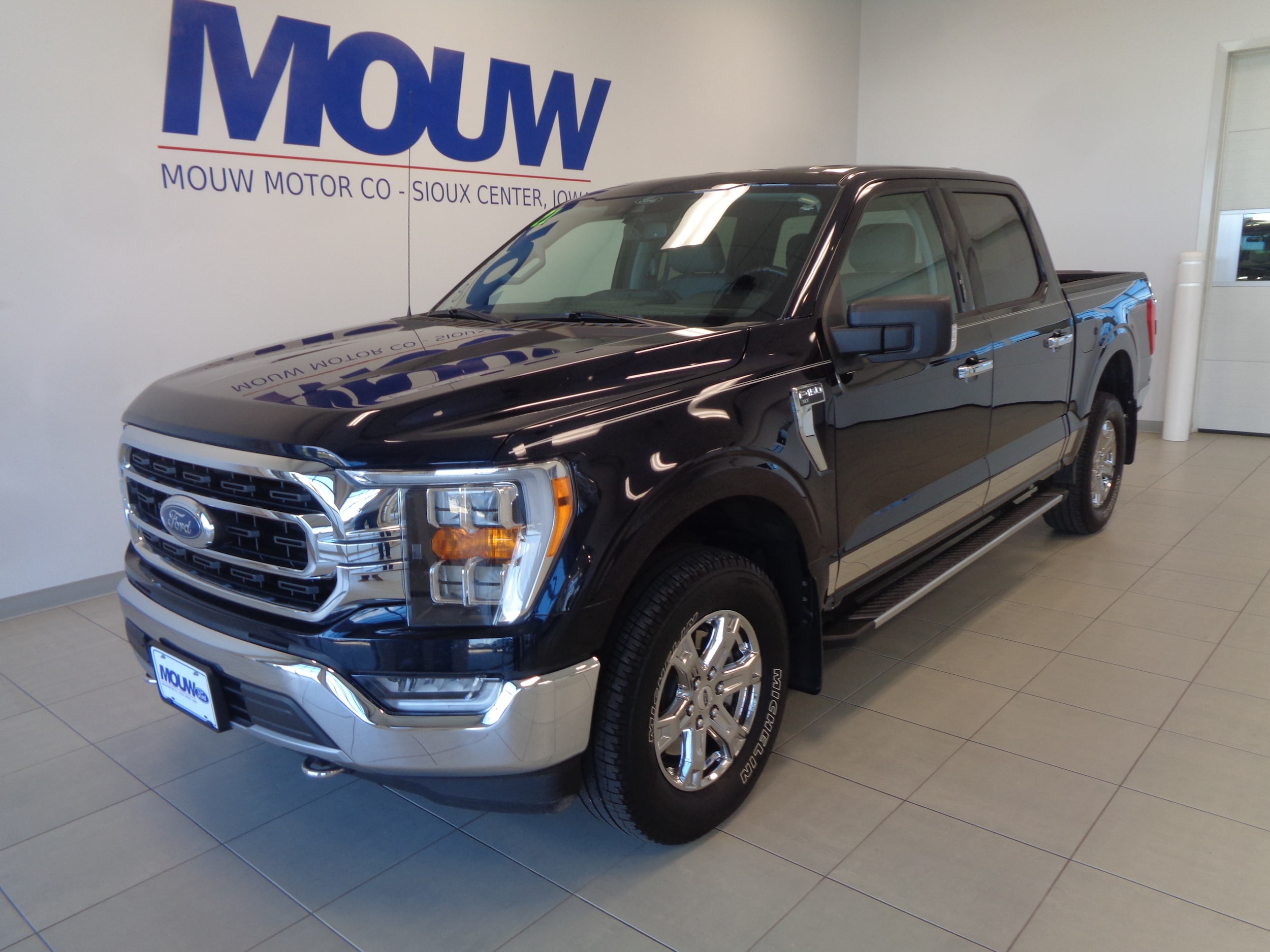 Used 2021 Ford F-150 XLT with VIN 1FTFW1E55MFB18440 for sale in Sioux Center, IA