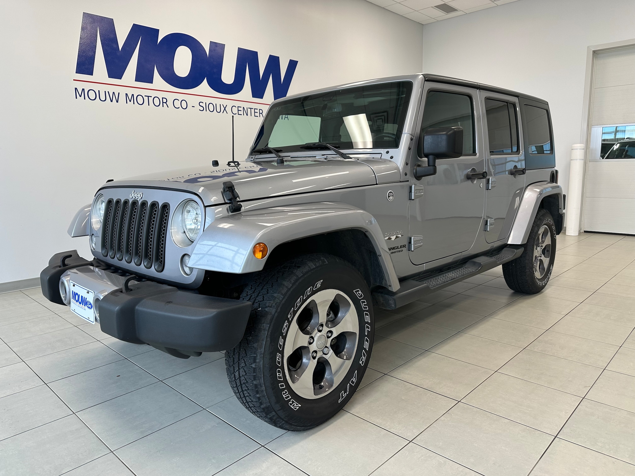 Used 2016 Jeep Wrangler Unlimited Sahara with VIN 1C4BJWEG1GL165160 for sale in Sioux Center, IA