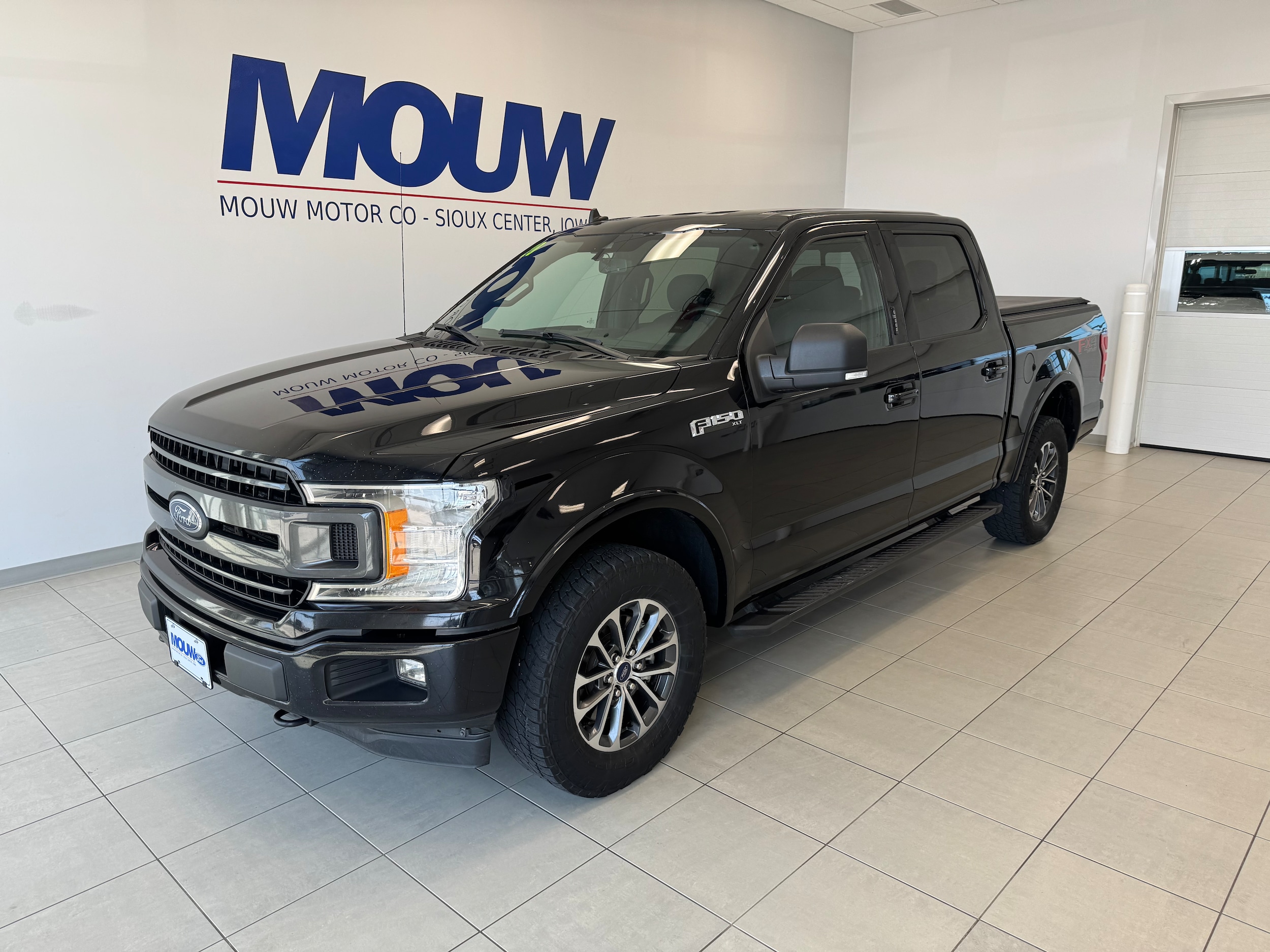 Used 2020 Ford F-150 XLT with VIN 1FTEW1E41LKE71766 for sale in Sioux Center, IA