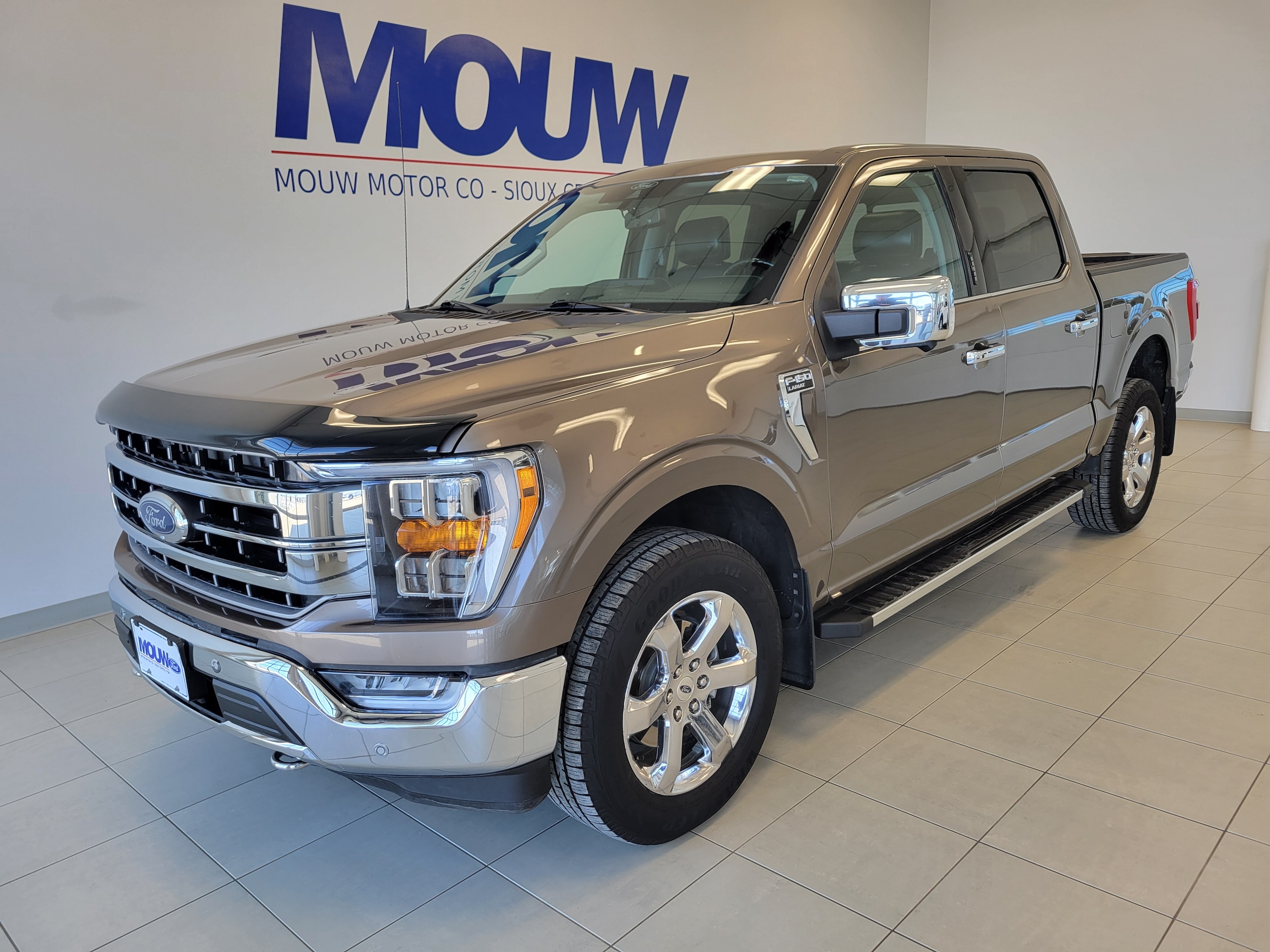 Used 2021 Ford F-150 Lariat with VIN 1FTFW1E8XMFA60660 for sale in Sioux Center, IA