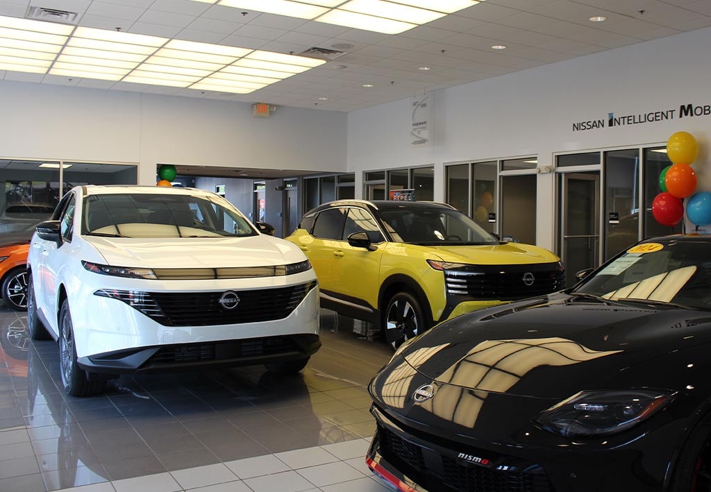  Person cheerfully signing documents.