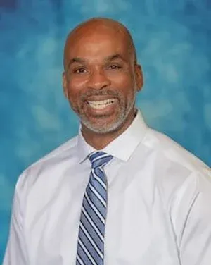 Staff member Perry Spiller from ID_843455