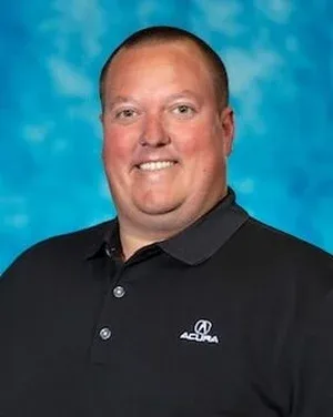 Staff member John Luedloff from ID_fdc0c0