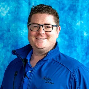 Staff member Spencer Mackenzie from ID_843455