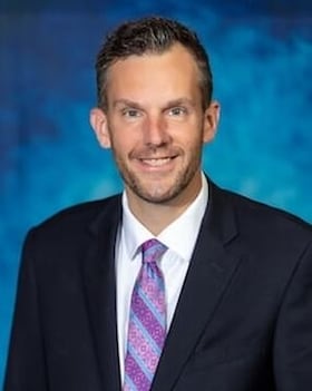 Staff member Rick Brennan from ID_843455