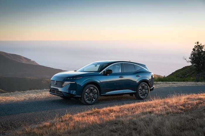 2026 Nissan Murano midsize SUV parked at a scenic overlook near sunset