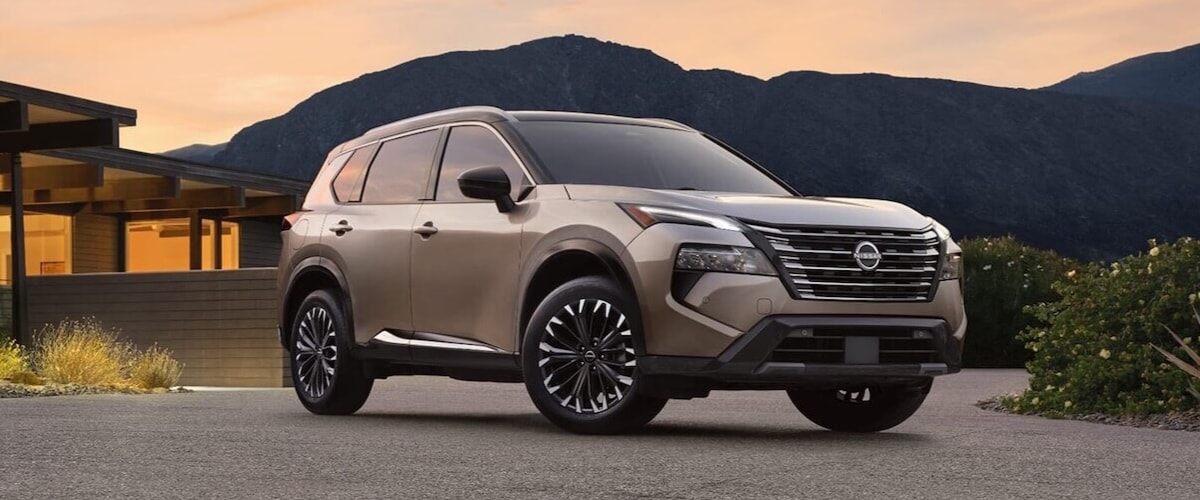 2026 Nissan Rogue Platinum SUV parked outside a modern home near Murfreesboro, Tennessee.