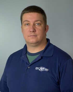 Staff member Travis Weinhardt from 974de0c802cd