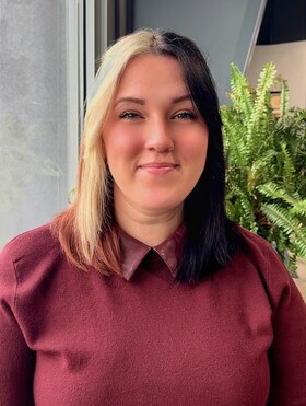 Staff member Kaytlin Krepich from 974de0c802cd