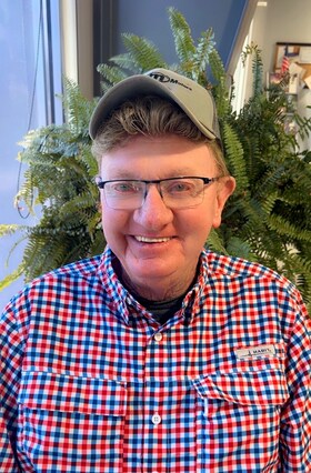 Staff member Lon Savage from 974de0c802cd