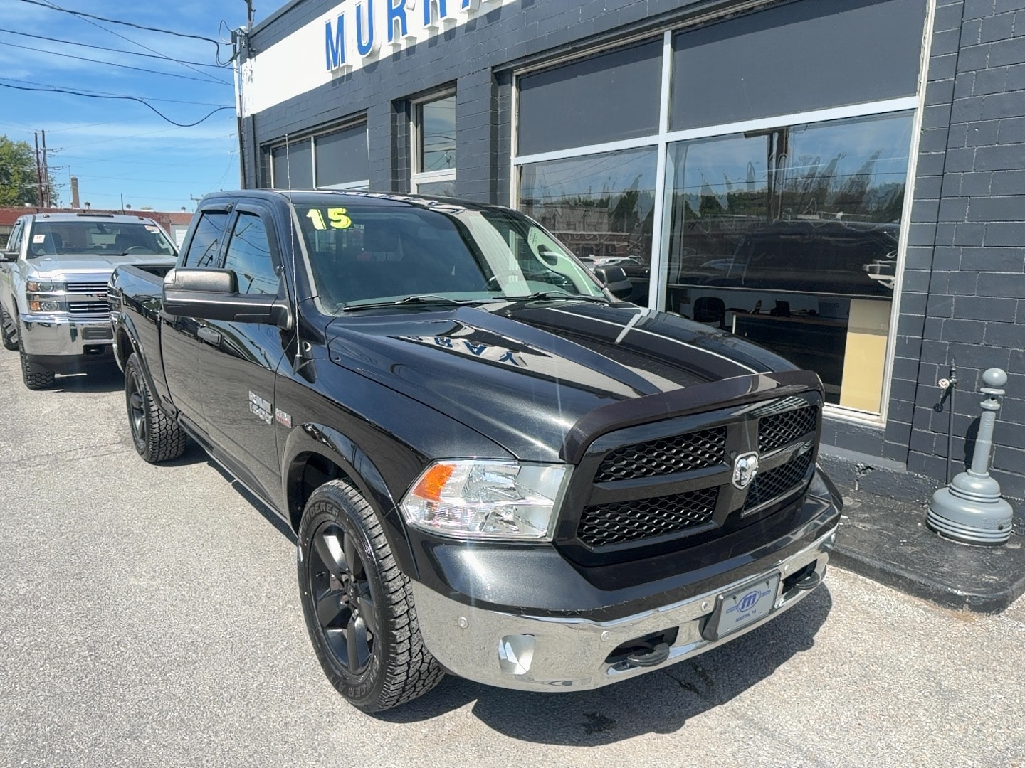2015 RAM 1500 Outdoorsman Quad Cab 4x4's photo