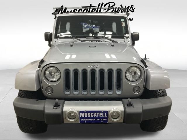 Used 2014 Jeep Wrangler Unlimited Sahara with VIN 1C4BJWEG7EL258472 for sale in Hawley, Minnesota