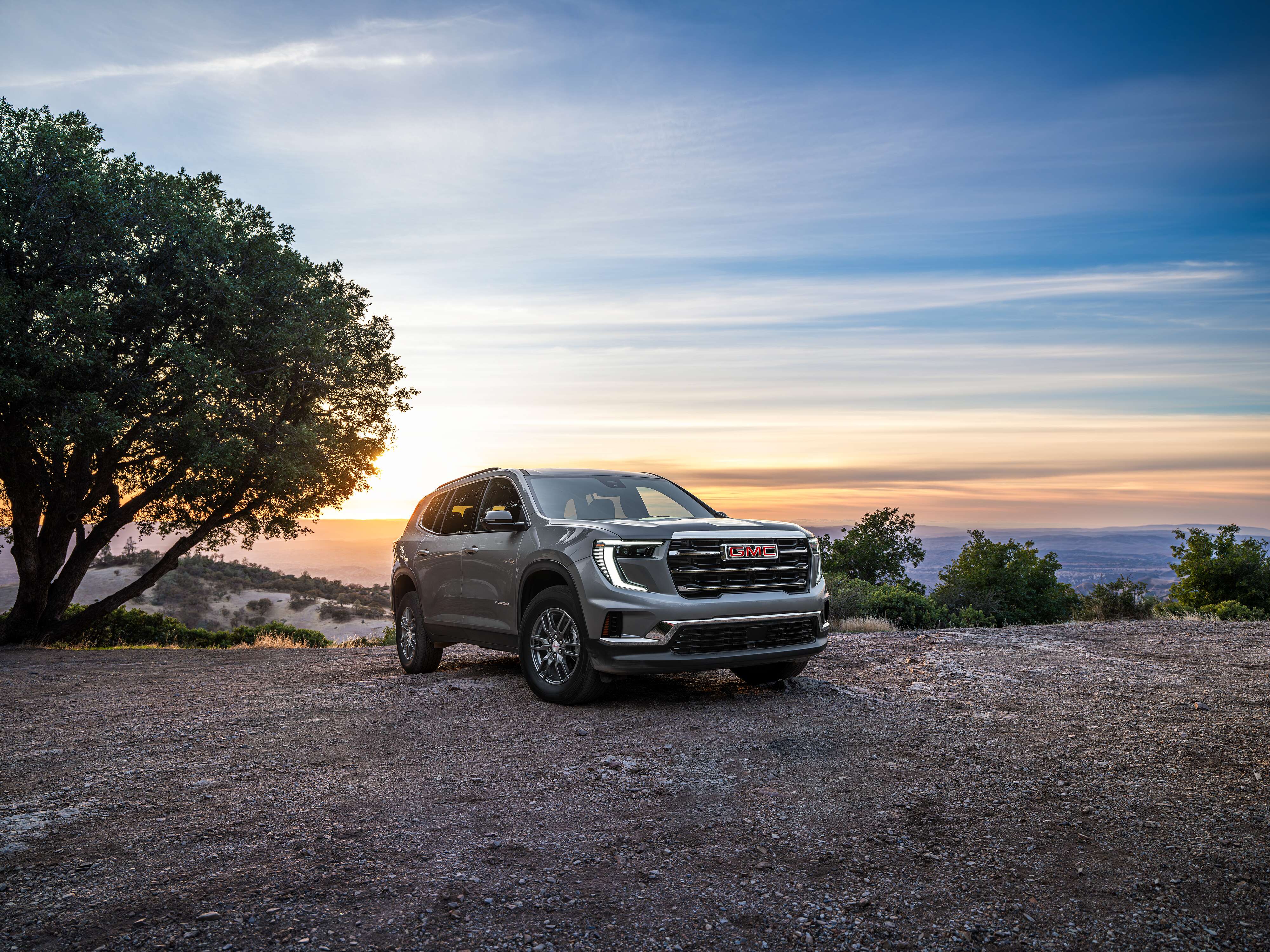 GMC Acadia Elevation GMC Acadia Elevation parked outdoors on a gravel area