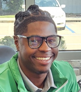 Staff member DeJuan Merrill from ID_b0bae4
