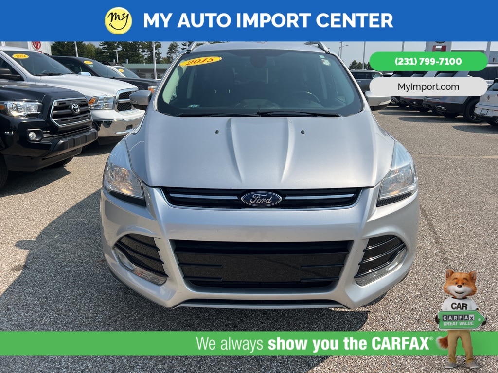 Used 2015 Ford Escape Titanium with VIN 1FMCU9J90FUB48214 for sale in Muskegon, MI