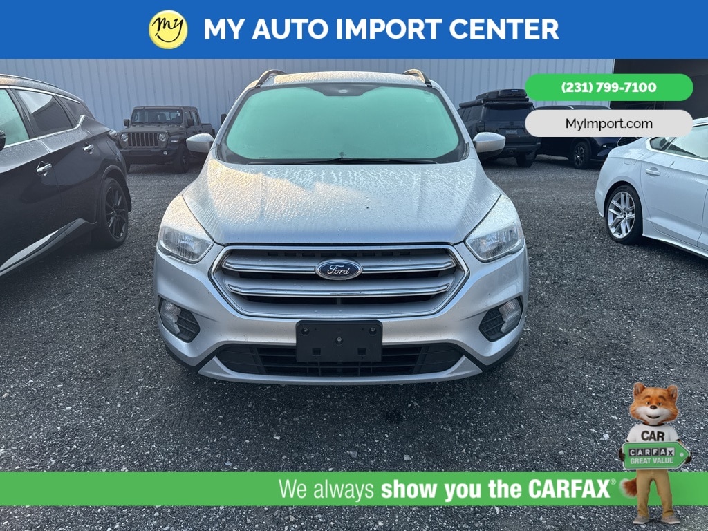 Used 2018 Ford Escape SE with VIN 1FMCU9GD5JUB56216 for sale in Muskegon, MI